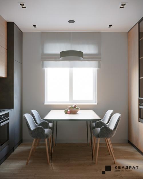 Кухня выполнена в минималистичном стиле за счет использования встроенных решений и минимума предметов декора. 03