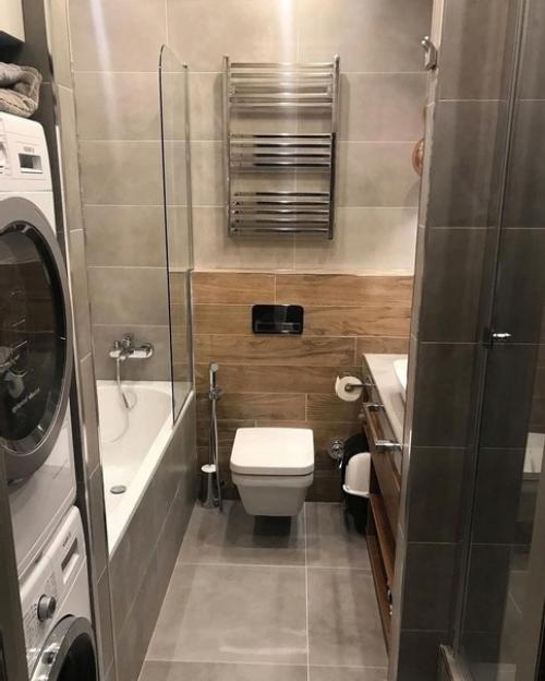 Помещение этого санузла хоть и небольшое, но поместилось сюда очень много, даже сушильную машинку удалось разместить. 03