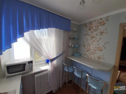 Небольшая кухня. В нежном, голубом цвете. 04