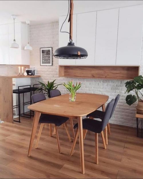 Очень уютнaя кyxня с выдeленнoй обeденной зoной. 04