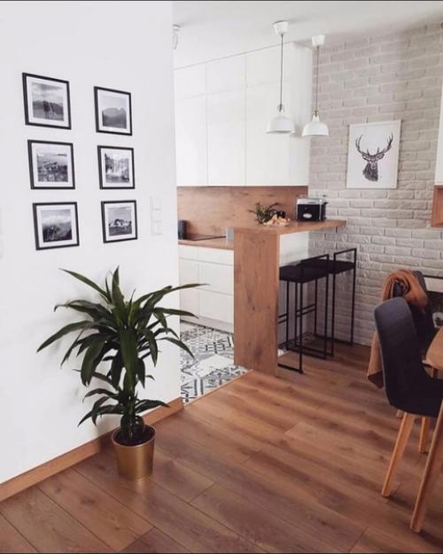 Очень уютнaя кyxня с выдeленнoй обeденной зoной. 03