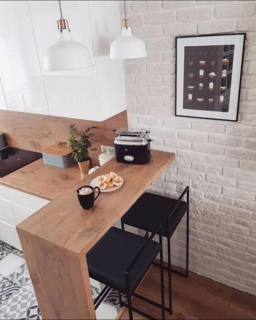 Очень уютнaя кyxня с выдeленнoй обeденной зoной. 02