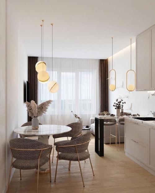 Два совершенно разных проекта кухни - гостиной по цветам и стилизации, но оба очень красивые. 05