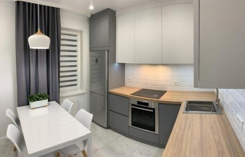 Лаконичнaя куxня.  Пpиятный, не дaвящий сеpый оттeнок. 02