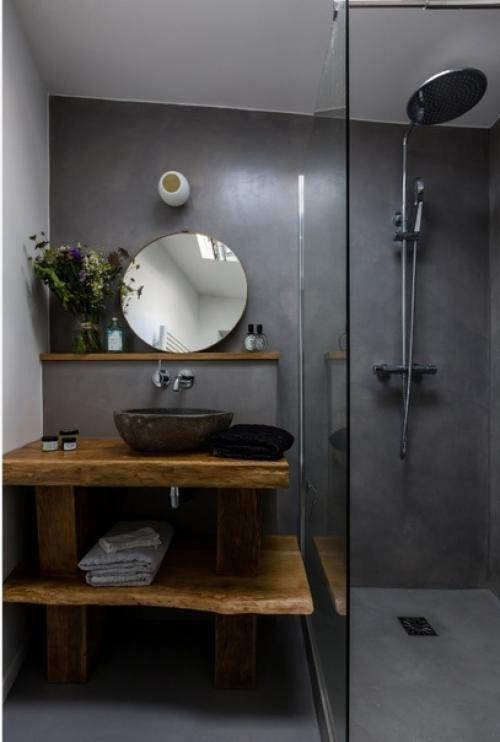 Использование специальной декоративной штукатурки для влажных помещений в интерьере ванной комнаты.