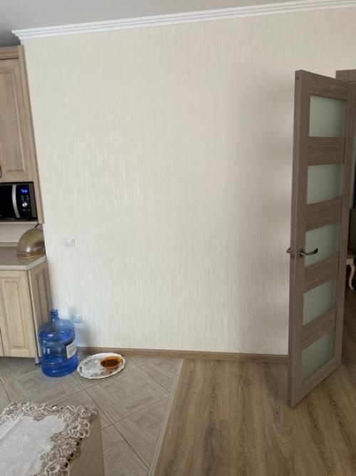 Совместили кухню и гостиную.