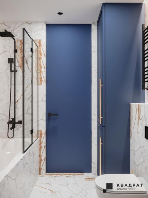 Дизайн санузла. В интерьере преобладает керамогранит в текстуре мрамора, на контрасте с ним играет оттенок синего. 01