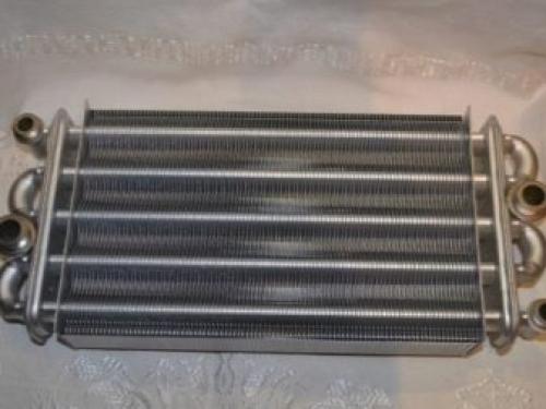 Чугунный теплообменник для котла. Особенности теплообменников для газовых котлов 06 Чугунный теплообменник для котла. Особенности теплообменников для газовых котлов 06