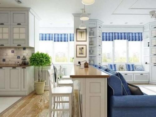 Маленькая кухня с барной стойкой и диваном. Барная стойка и диван