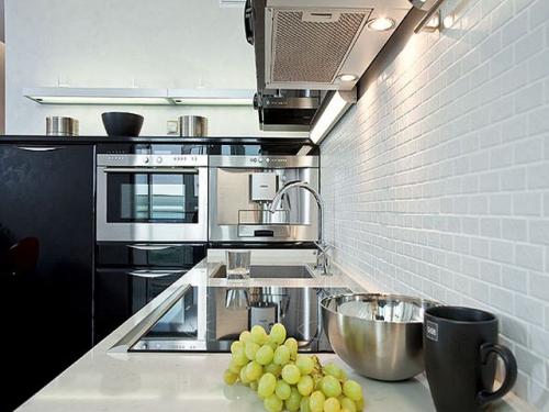 Белый кирпич стена в интерьере. Белая кирпичная стена в гостиной 31 Белый кирпич стена в интерьере. Белая кирпичная стена в гостиной 31