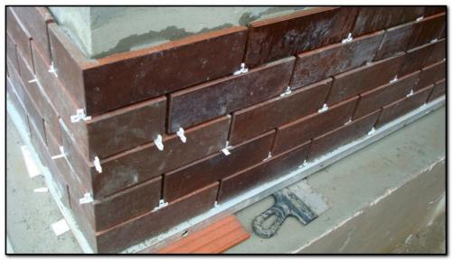 Чем обшить стены дома из пеноблока. Плитка