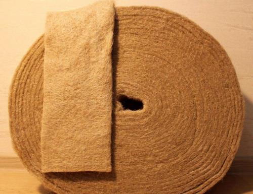 Укладка джута на профилированный брус. Джут