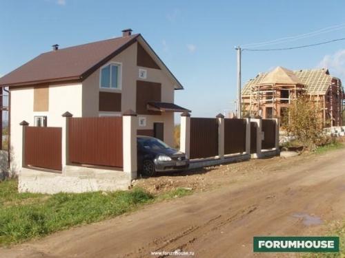 Гараж на участке с уклоном. Трудности строительства дома на участке со склоном