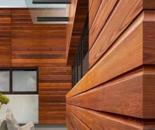 Чем обшить деревянный дом снаружи недорого и красиво