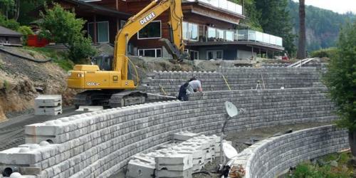 Проекты домов с цокольным этажом на склоне. Дом на склоне — идеи создания стильного дизайна современного дома 01