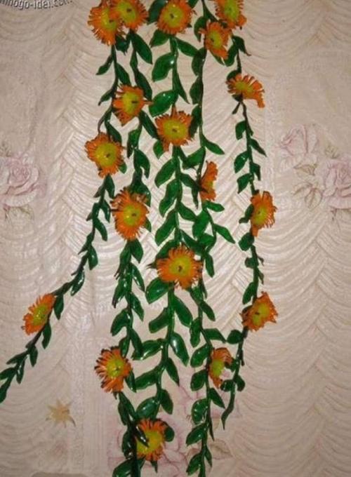 Что такое вьющиеся цветы из пластиковых бутылок. Вьющиеся цветы из пластиковых бутылок