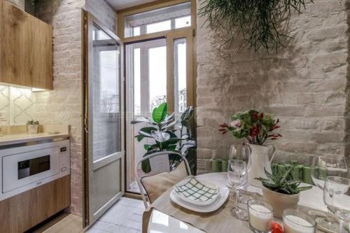 Интерьер кухни гостинной с кирпичной стеной. Как использовать кирпич в интерьере кухни