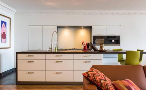 Недорогой дизайн однокомнатной квартиры. Выбираем краски для бюджетного ремонта