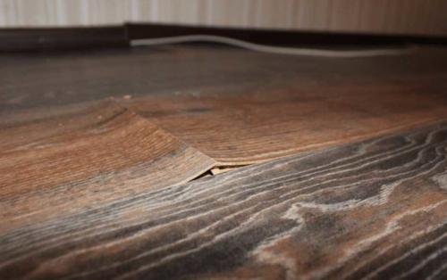 Как убрать вздутие ламината после намокания. Почему вздувается ламинат: причины и последствия 01